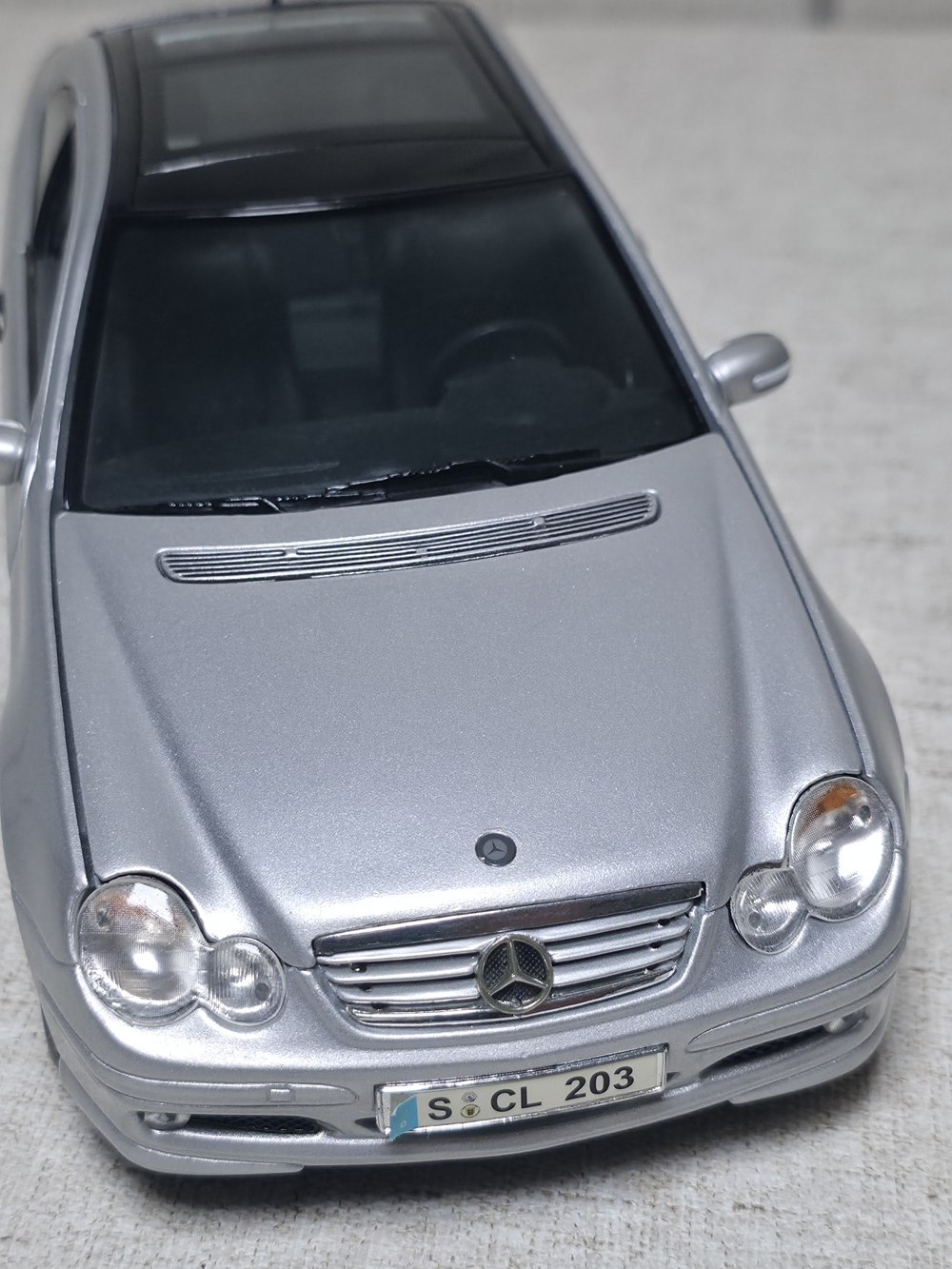 Silver Die-Cast Car Model - Detailed Front Grill